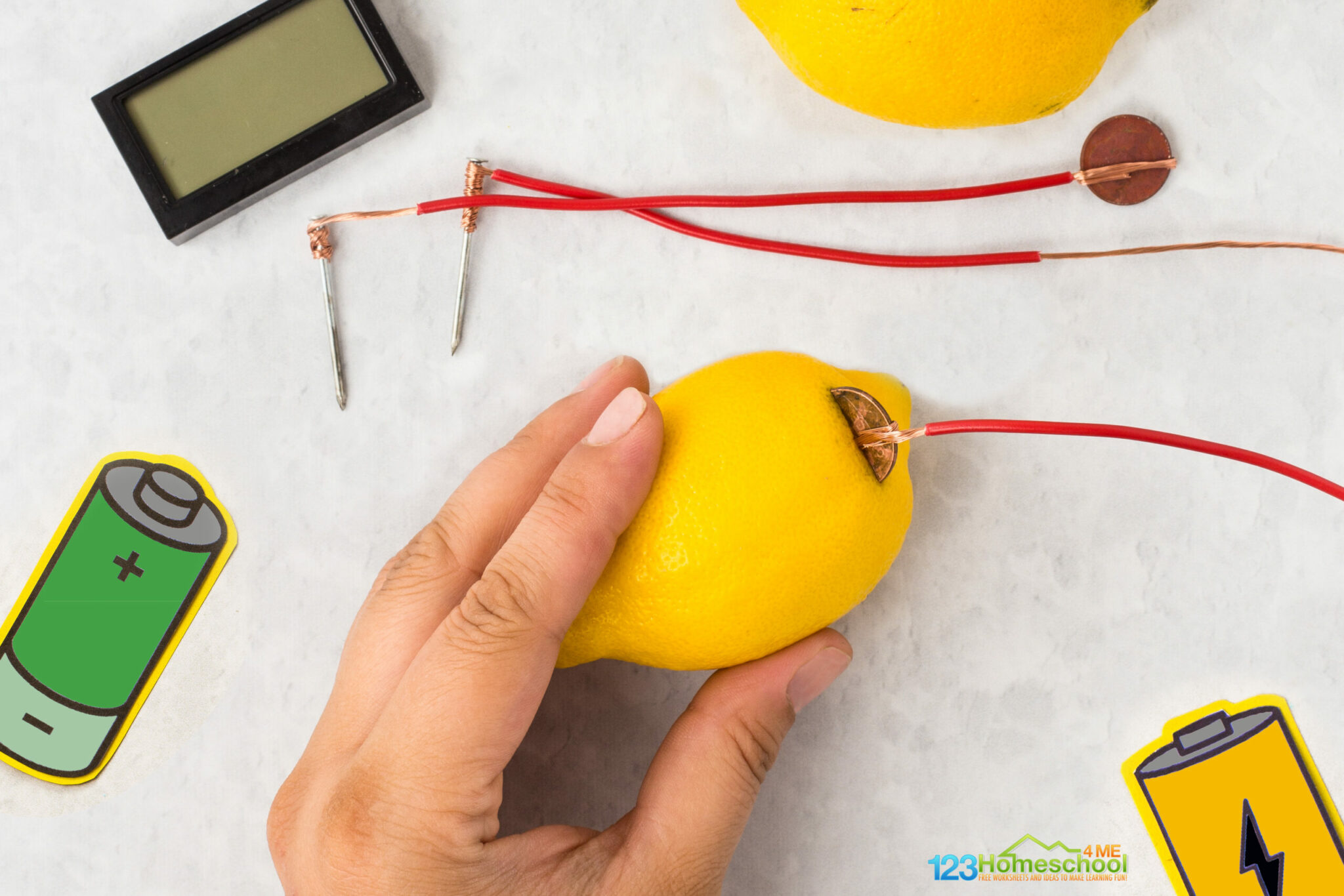 how do fruit powered clocks work using lemons and oranges as batteries