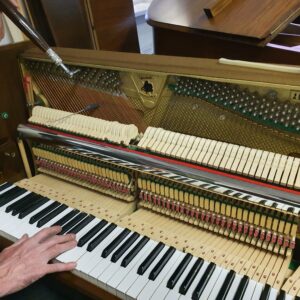 how do piano tuners tune a piano using a tuning fork and intervals scaled