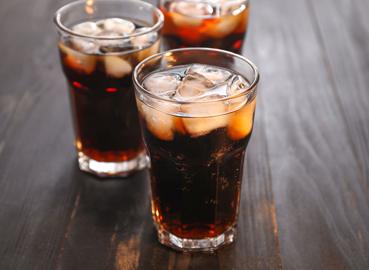 how does drinking soda pop like coke cause bones to weaken