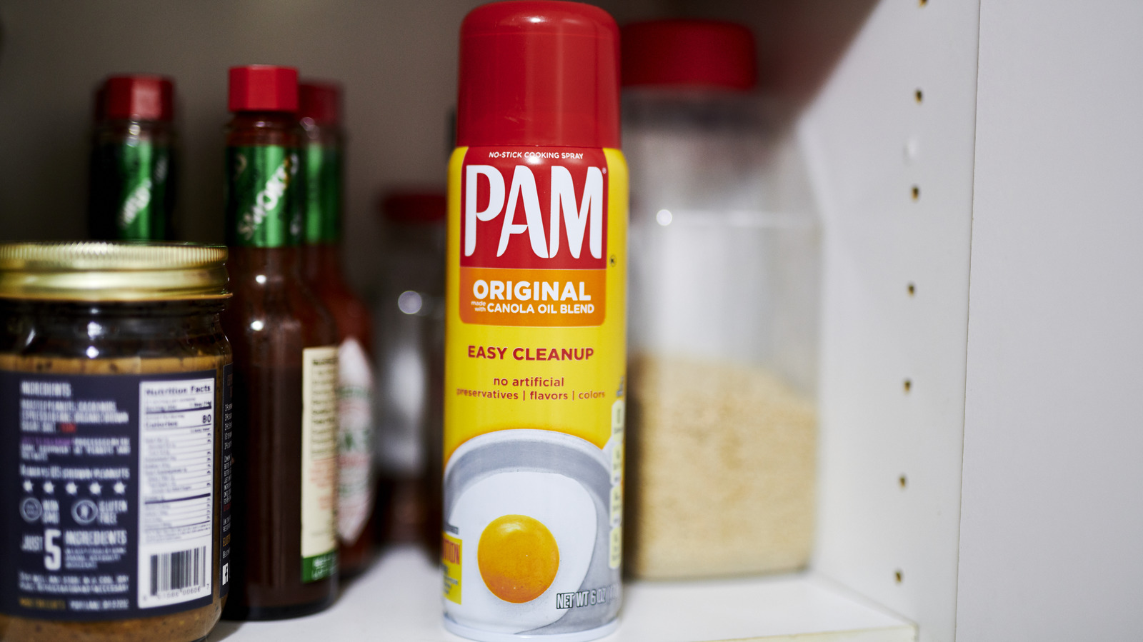 how does nonstick cooking spray work and what is pam made of