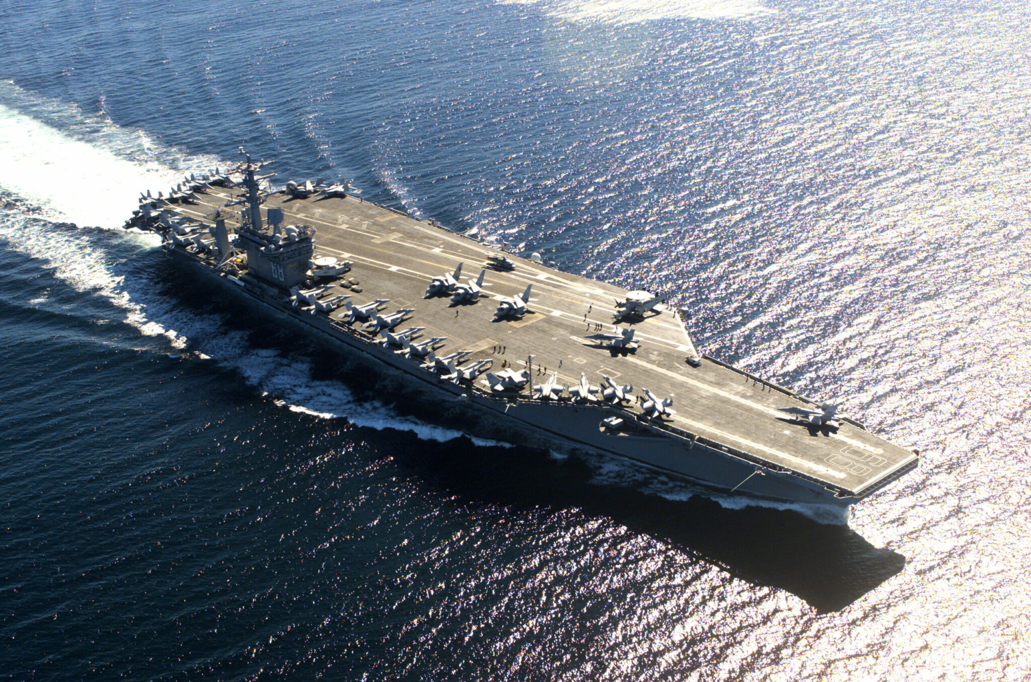 how much does an aircraft carrier weigh and how is the weight of a ship calculated scaled