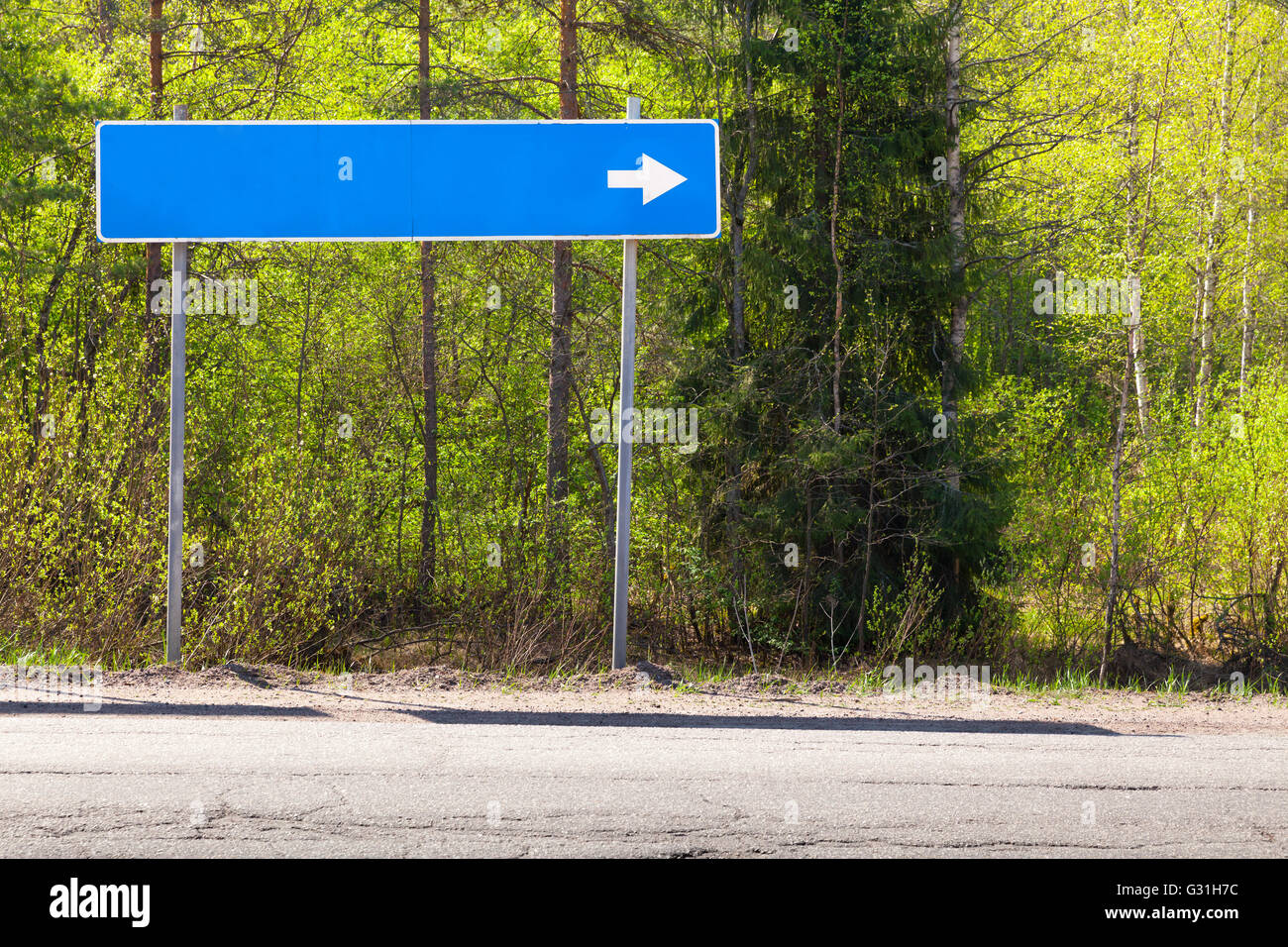 what are those green or white signs with numbers that are placed along interstate highways