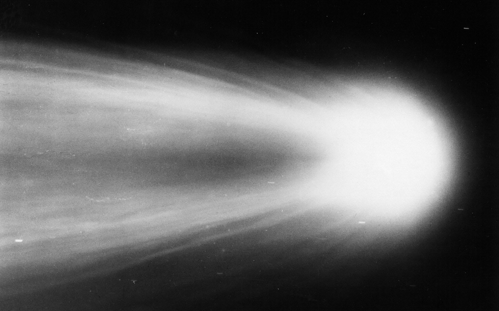 what happens if earth passes through a comets tail and what were the superstitions surrounding halleys comet