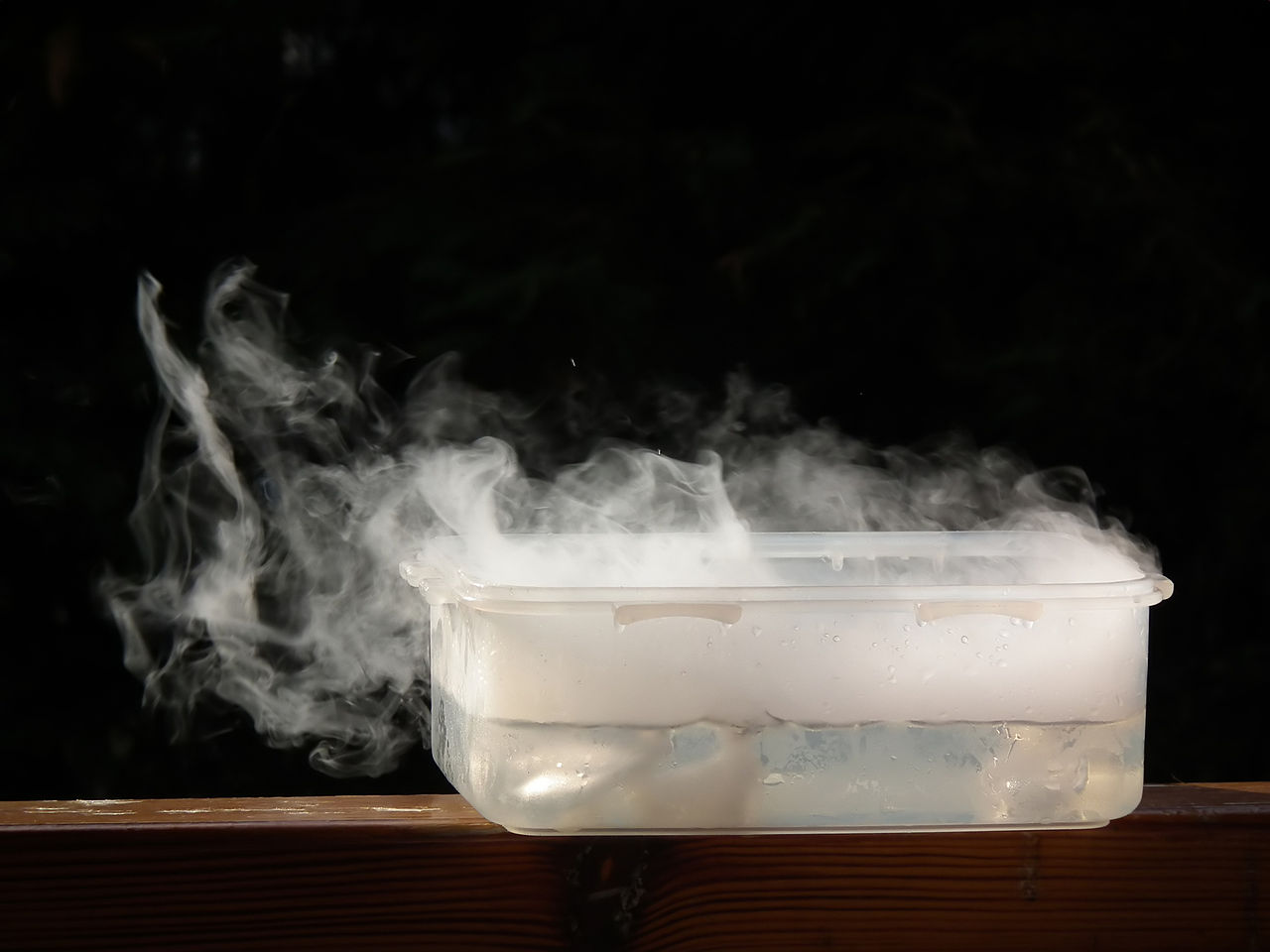 what is dry ice made of and why does dry ice produce smoke