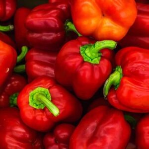 what is the chemical change when a green pepper becomes red and what causes the ripening process
