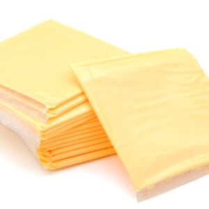 what is the difference between processed cheese and real cheese and how is artificial cheese made