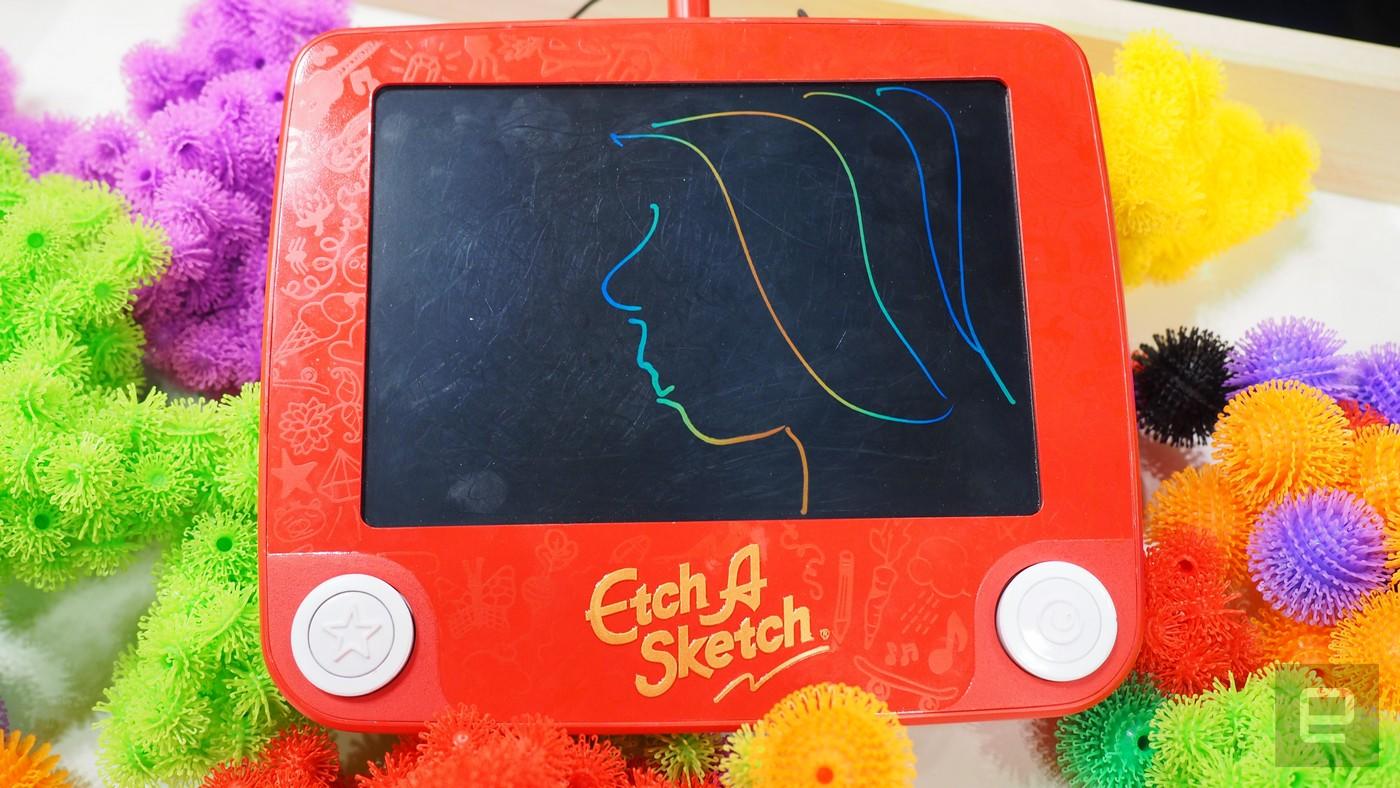 what is the silver stuff in an etch a sketch and how does it work