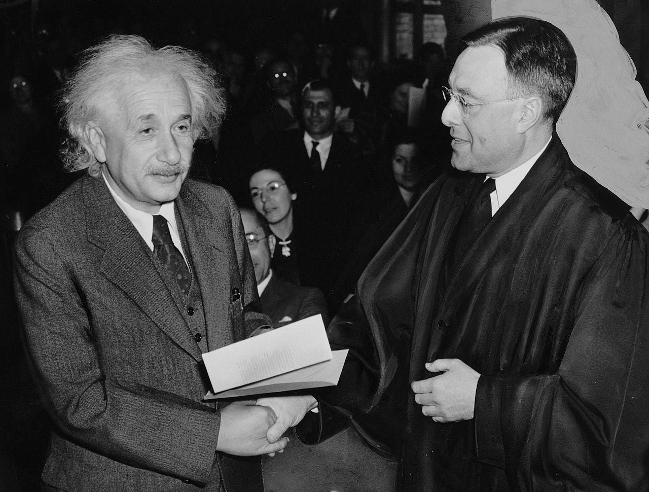 what was albert einsteins involvement in the making of the atom bomb during world war two