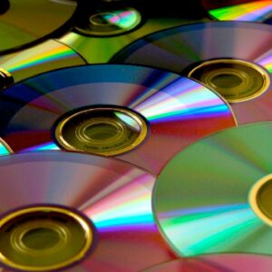 when was the compact disc invented and how do they get the music onto a cd