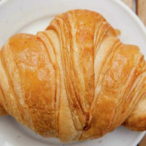 where did croissants or crescent rolls come from and how did the pastry originate