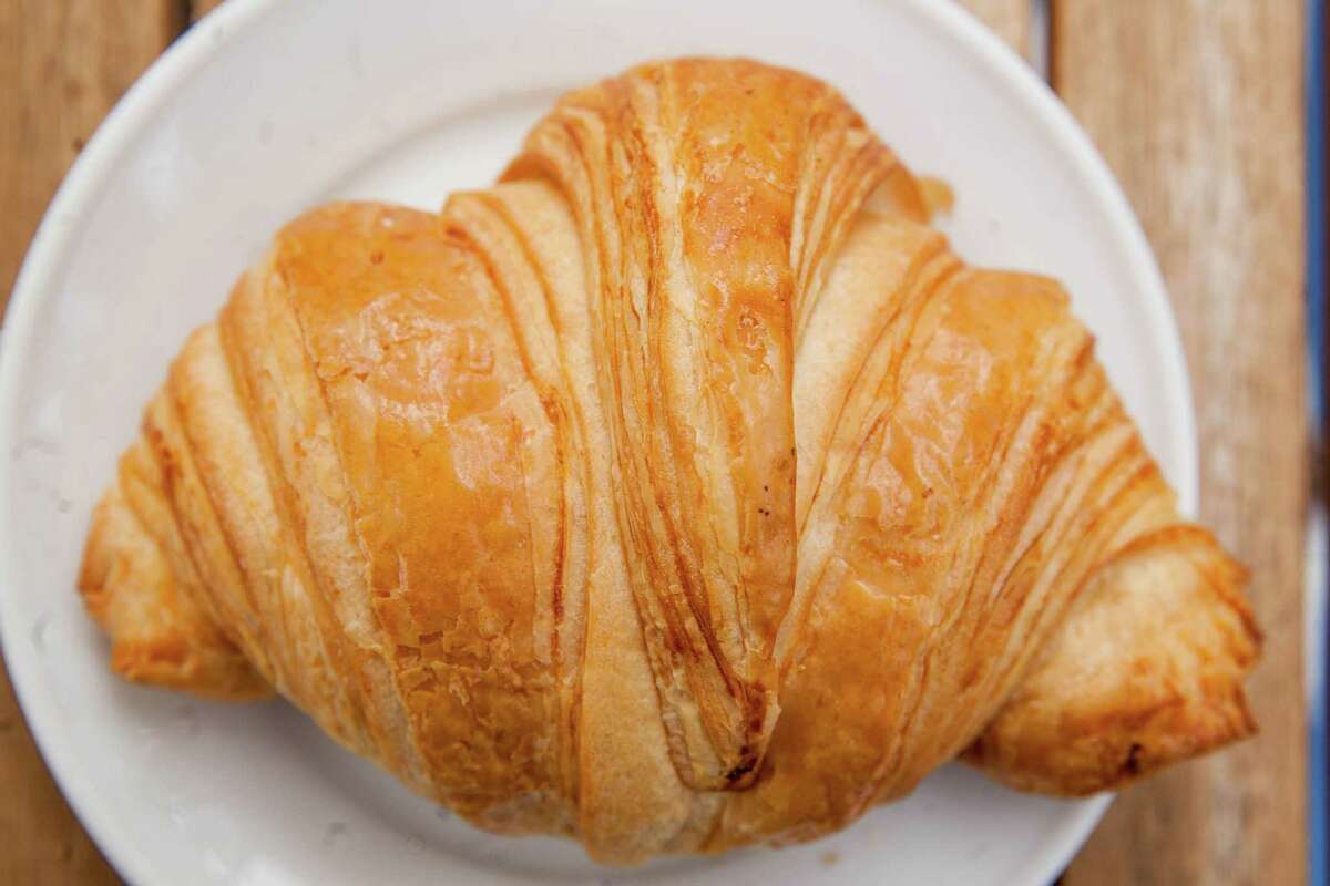 where did croissants or crescent rolls come from and how did the pastry originate