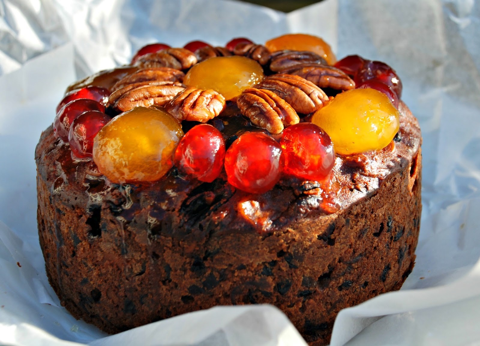 where did the christmas cake tradition come from and what does fruitcake on christmas symbolize