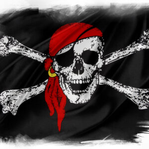 where did the jolly roger flag with the skull and crossbones come from and how did the name originate