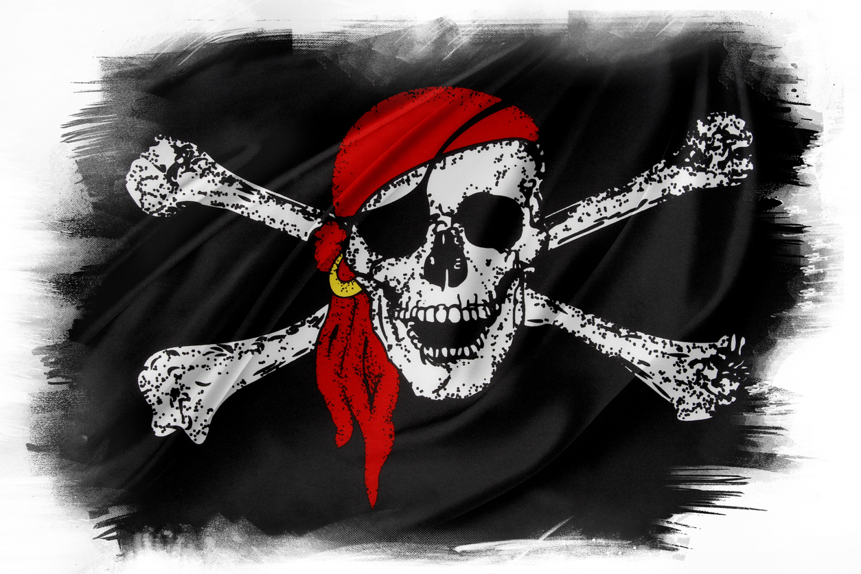 where did the jolly roger flag with the skull and crossbones come from and how did the name originate