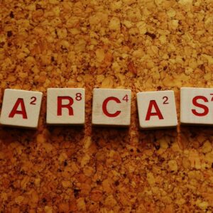 where does the word sarcasm originate and what does sarcasm mean in greek