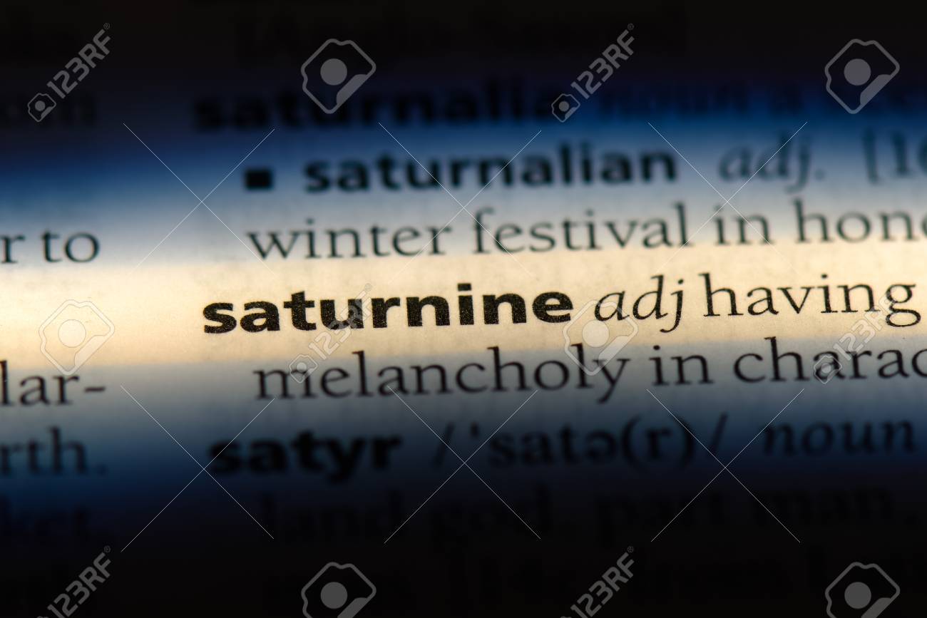 where does the word saturnine come from and what does saturnine mean