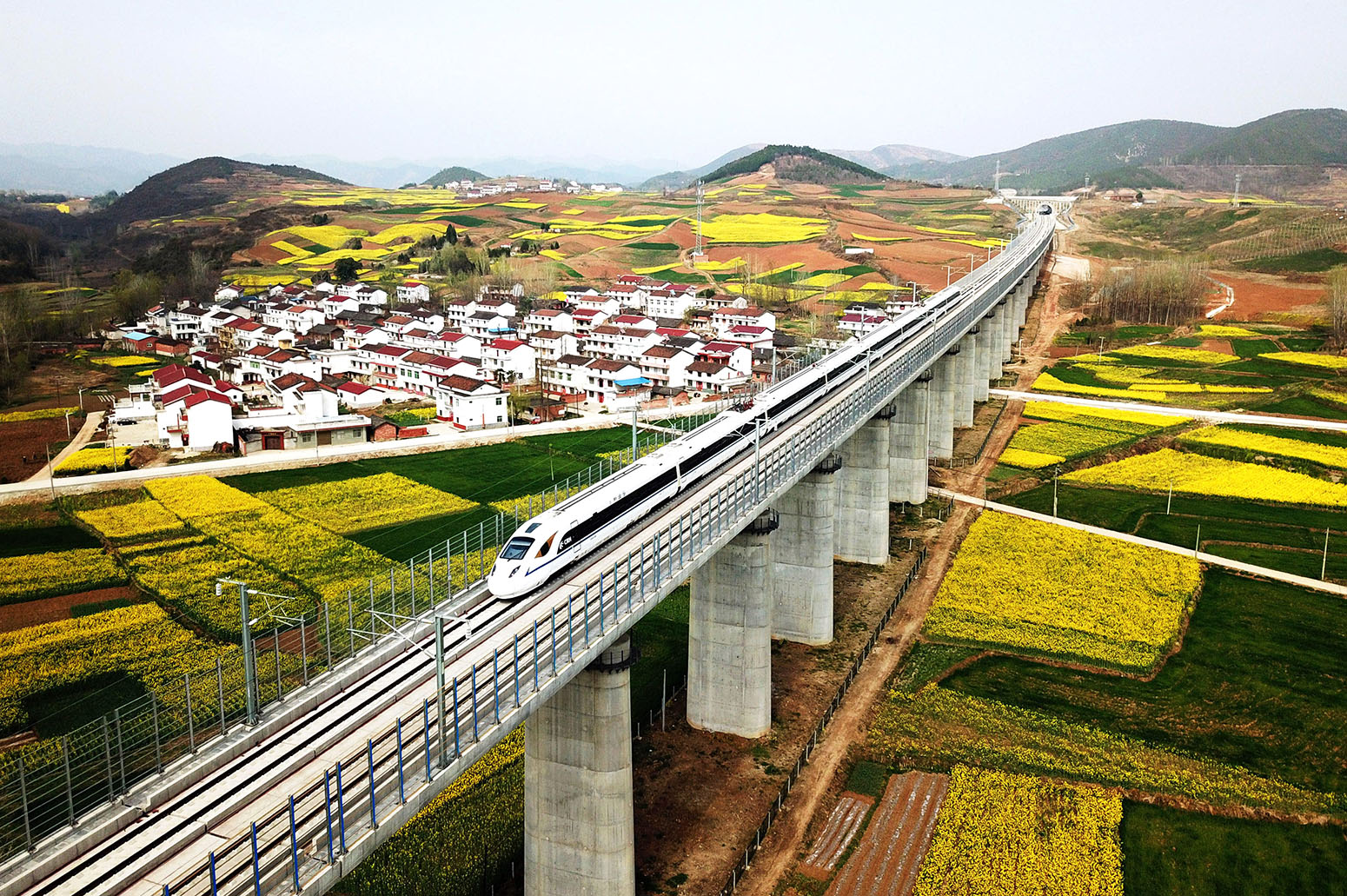 which country has the fastest trains on earth and the busiest railroads in the world