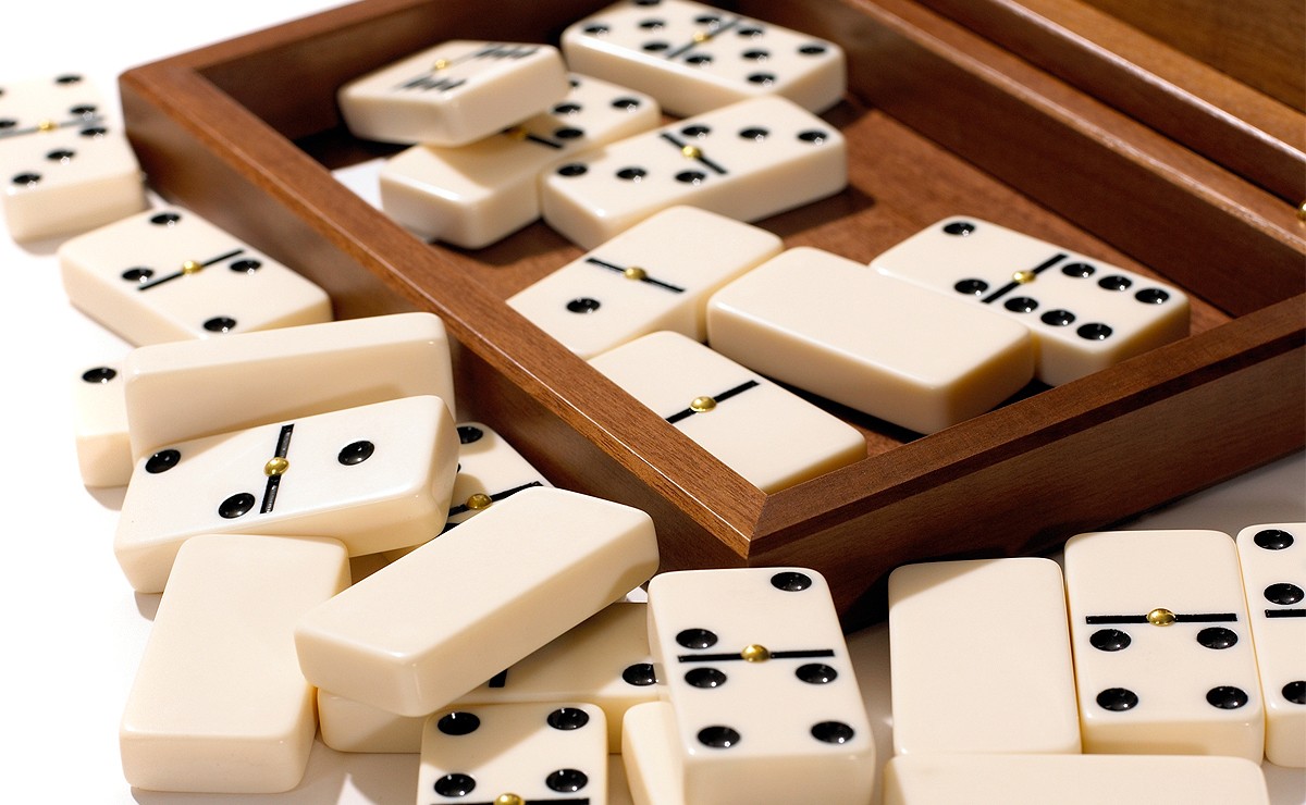 who invented dominoes and how old is the game of dominoes
