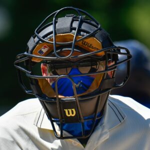 who invented the first baseball catchers mask and when did protective masks become mandatory for all catchers