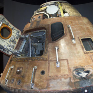 who was the first american to orbit the earth and how long did the spacecraft friendship 7 spend in orbit scaled