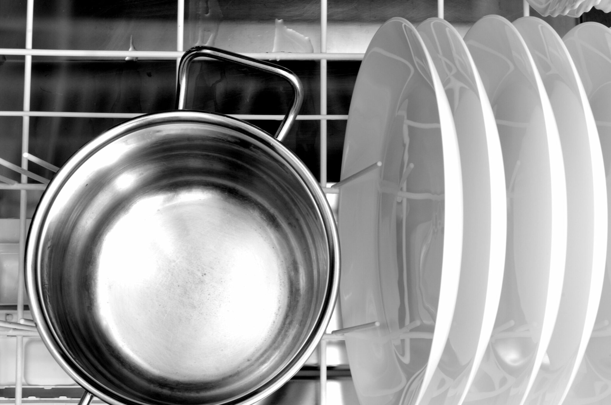 why does aluminum cookware corrode and become discolored in the dishwasher scaled