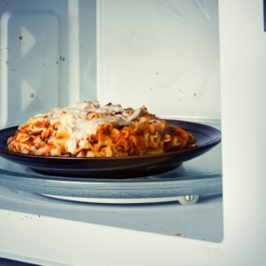 why does microwave cooked food cool off faster than food cooked in a conventional oven