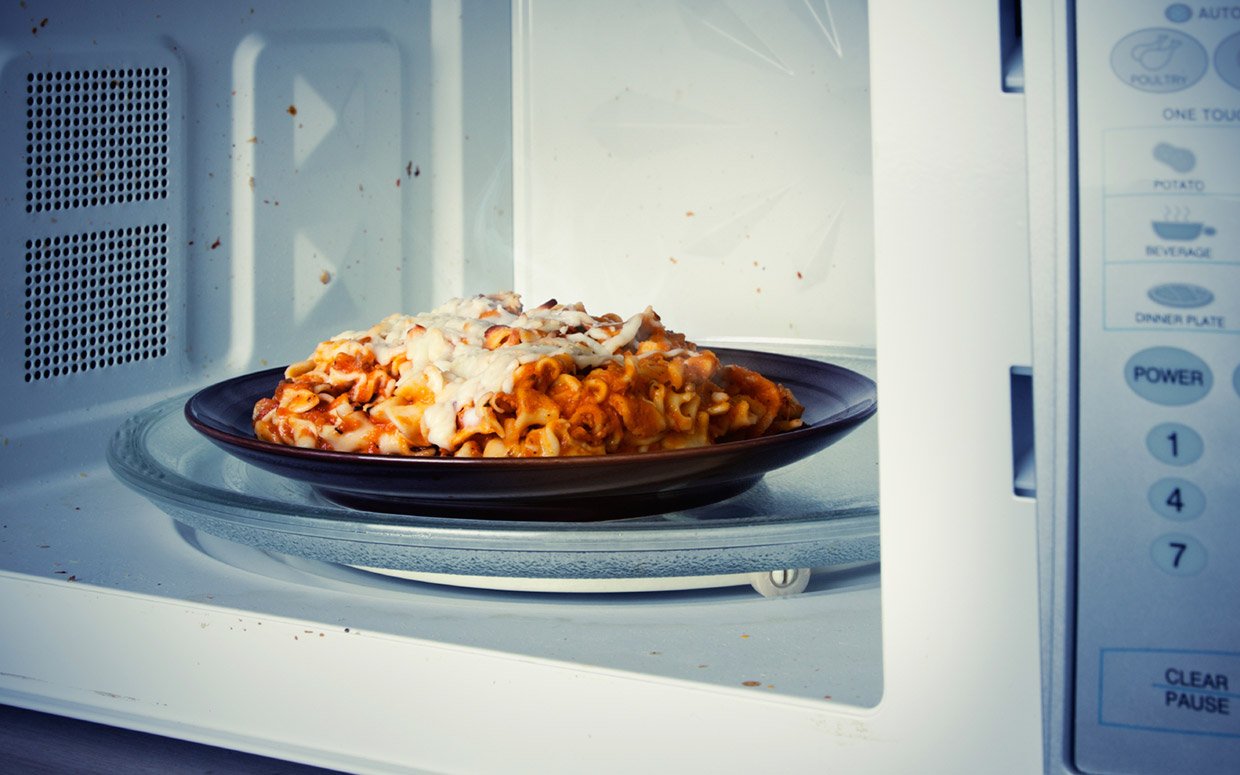 why does microwave cooked food cool off faster than food cooked in a conventional oven