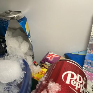 why does soda pop from the fridge freeze when you open it