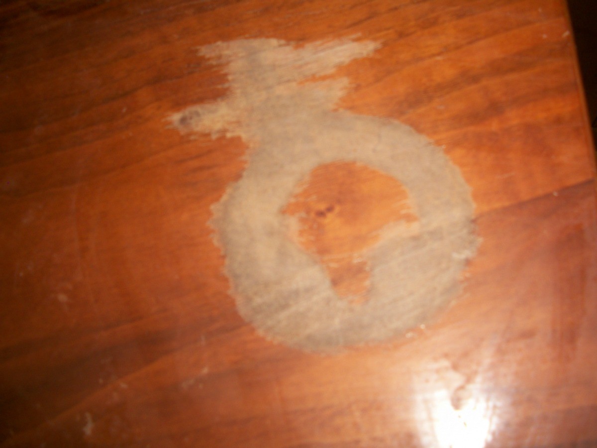 why does spilled coffee on my kitchen counter form a brown ring when it dries