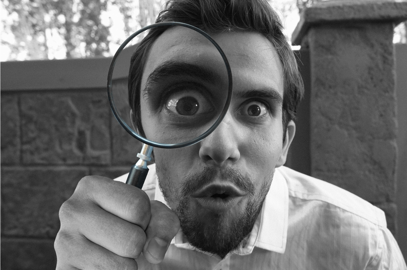 magnifying glass detective looking