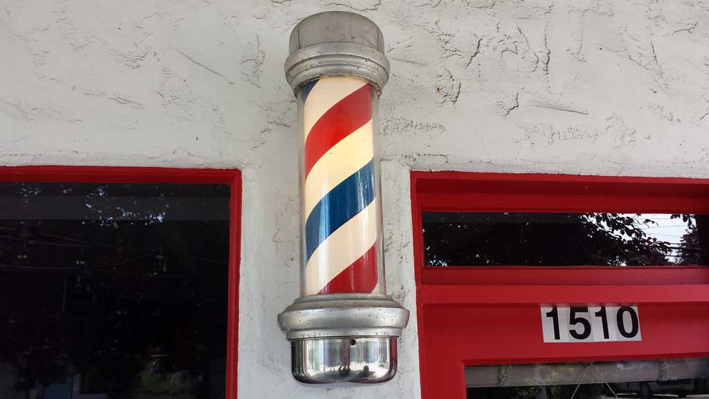 red and white barber shop pole